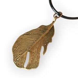 Gold tone stylized feather pendant necklace